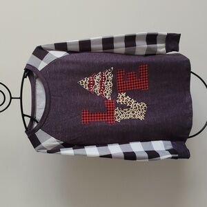 Jersey style, eye catching graphic, buffalo print sleeves NWOT